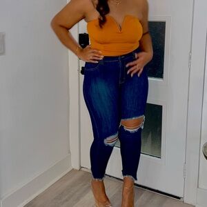 Orange v cut bodysuit